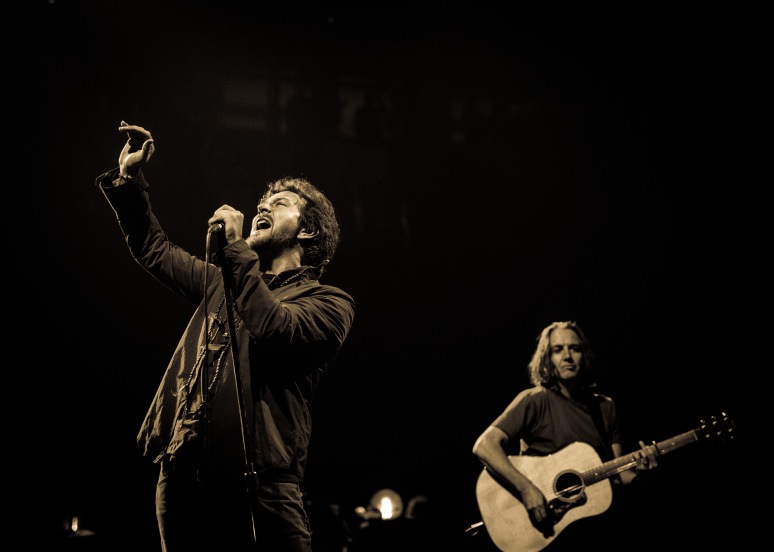 Eddie Vedder of Pearl Jam at Key Arena in Seattle on the final night of their "Lightning Bolt" tour. Photo by John Lill